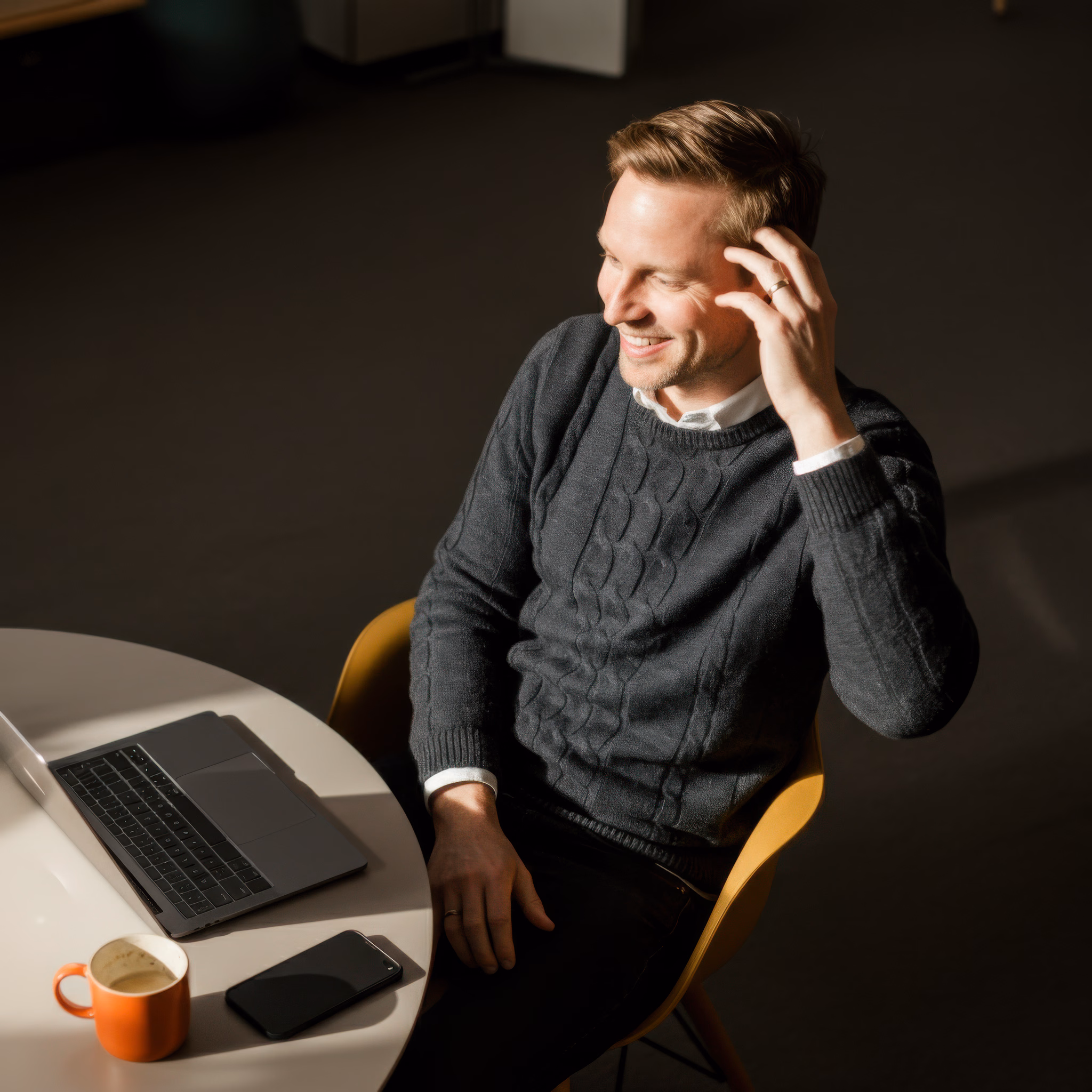 Man sitting by desk